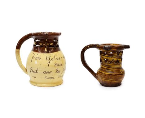 A Slipware Puzzle Jug, possibly Halifax, of traditional form, inscribed OLD TED CASTLE INN 1909, 17cm high; and Another, insc
