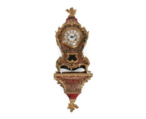 A French Red Tortoiseshell ''Boulle'' Bracket Clock with Wall Bracket, early 20th century, ''boulle'' case with applied scrol