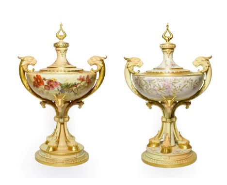 A Pair of Royal Worcester Porcelain Vases and Covers, 1892/1893, of urn shape with mythical beast handles, hoof supports and 