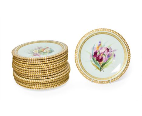 A Set of Sixteen Royal Worcester Porcelain Dessert Plates, circa 1870, painted with flowersprays on a turquoise ground within