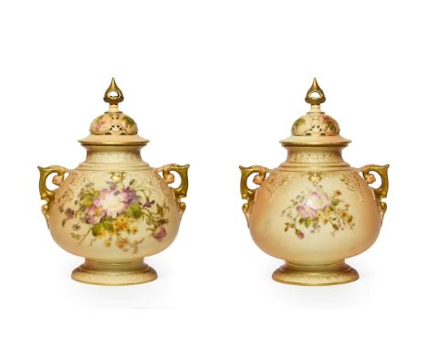 A Matched Pair of Royal Worcester Porcelain Vases and Covers, 1917/1919, of ovoid form with scroll handles, the domed cover w