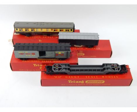 A Tri-ang dublo Long Box Car, Track Cleaning Car with fluid, Trestrol wagon, and a W R Restaurant car, boxed, (4).