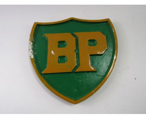BP, a painted cast metal advertising sign.