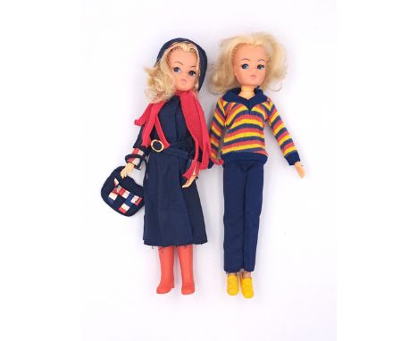 Pedigree Sindy pair of vintage 1970s dolls: (1) Sindy Gen 2 doll, blonde (some plugs missing), wearing Rock 'n' Roller Blue 1