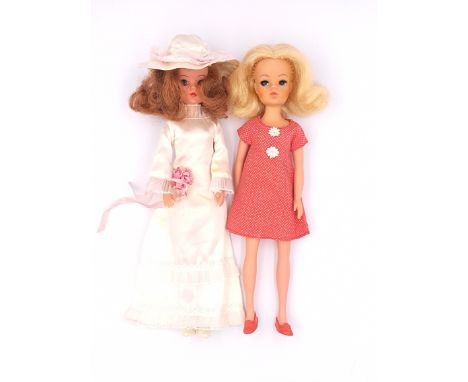 Pedigree Sindy pair of vintage 1970s dolls: (1) blonde (hair distressed some plugs missing), wearing Summery Days 1975; (2) a