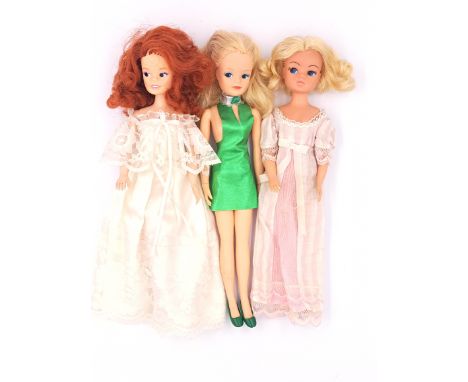 Pedigree Sindy three vintage 1980s dolls, including: (1) 1980 Pink 'n' Frilly; (2) 1986 Disco Dress; (3) 1986 Marie Bride; Fa