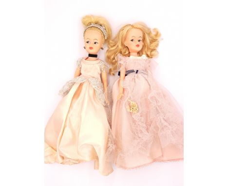 Horsman pair of vintage dolls, 1965: (1) Disney Cinderella, wearing original costume, missing shoes; (2) Doll, blonde re-root
