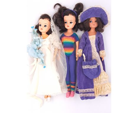 Pedigree Sindy three vintage 1980s dolls, including: (1) 1980 Nostalgia; (2) 1983 Beautiful Bride; (3) 1984 Stardance; Fair P