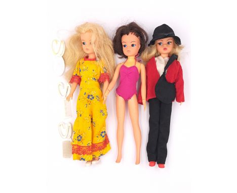Pedigree Sindy three vintage 1980s dolls, including: (1) 1980 Summertime Fun; (2) 1980 Styling Sindy; (3) 1981 Shop Around; F