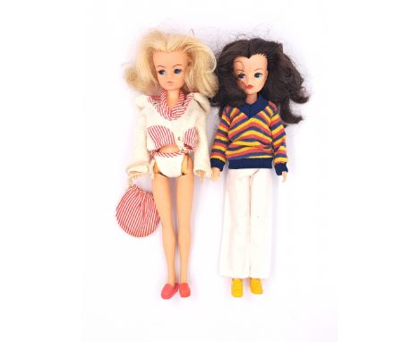 Pedigree Sindy pair of vintage 1970s dolls: (1) Sindy doll, brunette, wearing Rock 'n' Roller White 1979, body discoloured; (