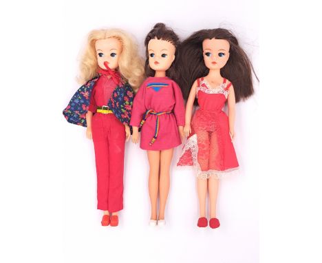 Pedigree Sindy three vintage 1980s dolls, including: (1) 1985 Pink Dress; (2) 1985 Red Raver; (3) 1983 Hair Stylist; Fair Plu