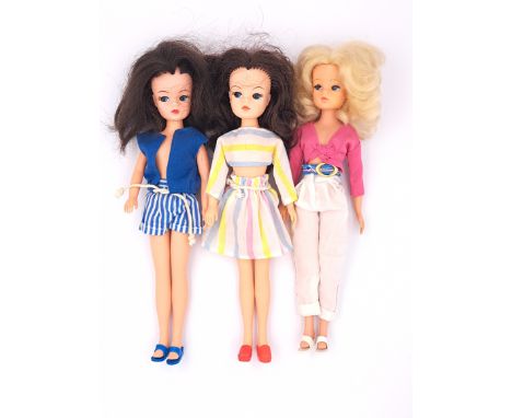Pedigree Sindy three vintage 1980s dolls: (1) 1985 Pink Top, White Trousers; (2) 1985 Fantasia Skirt and Top; (3) 1985 Shorts