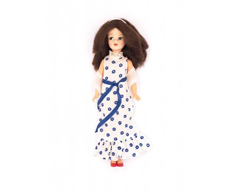 Pedigree Sindy centre part vintage doll, brunette (distressed and missing some plugs), wearing 1970 Belle of the Ball white s