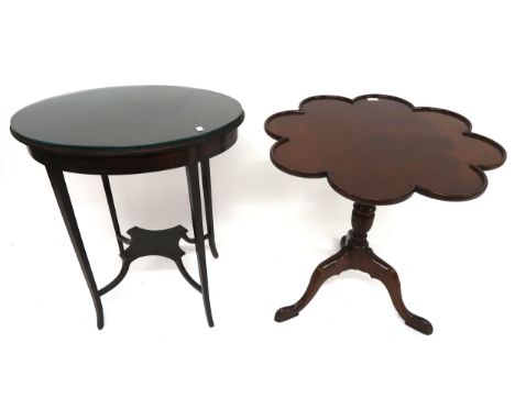 A Victorian mahogany tilt top occasional table with shaped top on tripod base and an oval two tier occasional table (2) Condi