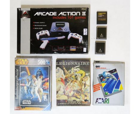 Vintage video/computer gaming equipment, comprising Atari games cartridges, a boxed Arcade Action II console and&nbsp;Legionn