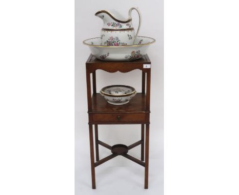 A Georgian mahogany bedroom washstand with Spode ceramic wash basin, jug and soap dish over single drawer over crossed stretc