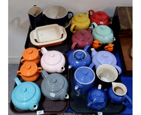 A collection of Le Creuset ceramic items including teapots, jugs, casserole dishes etc Condition Report:No condition report a