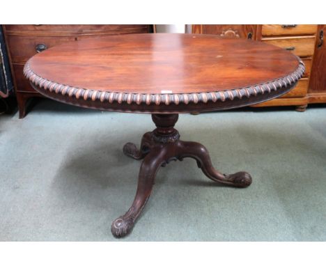 A Victorian rosewood oval tilt topped breakfast table on tripod base, 74cm high x 129cm long x 105cm deep Condition Report:Av