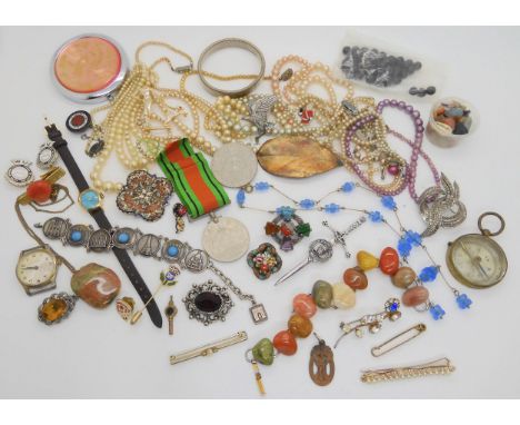 An enamel and seed bead brooch, a compass, a Defence Medal 1939- 1945 and other items Condition Report:No condition report av