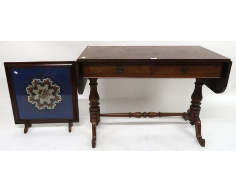 An early 20th century mahogany two drawer sofa table, 75cm high x 109cm wide x 53cm deep and a tapestry fire screen (2) Condi