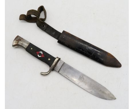 A WW2 German Third Reich Hitler Youth dagger/knife, the chequer grip inset with enamel swastika diamond badge, the blade engr