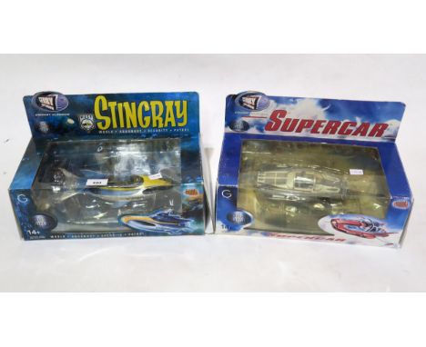 Two boxed Gerry Anderson diecast scale model vehicles by Product Enterprise Limited: a Supercar and a WASP Stingray (2) Condi