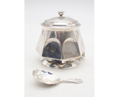 An Edwardian silver tea caddy, of octagonal form, on a circular base, by&nbsp;Henry Williamson Ltd, Birmingham 1908, and a si