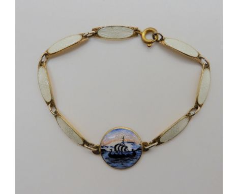 A Norwegian silver and enamel Viking longship bracelet, length 18cm Condition Report:No condition report available