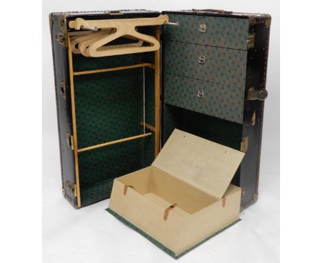 An early 20th century metal bound cabin robe steamer trunk, 102cm high x 57cm wide x 41cm deep Condition Report:Available upo