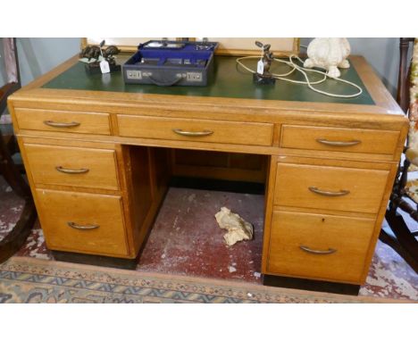 Oak leather top pedestal desk - W: 129cm D: 68cm H: 79cm 