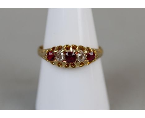 18ct gold ruby and diamond ring - Size Q 