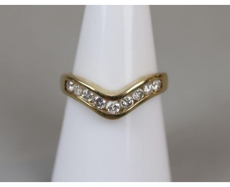 Gold wishbone ring set with 1/2 carat of diamonds - Size N 