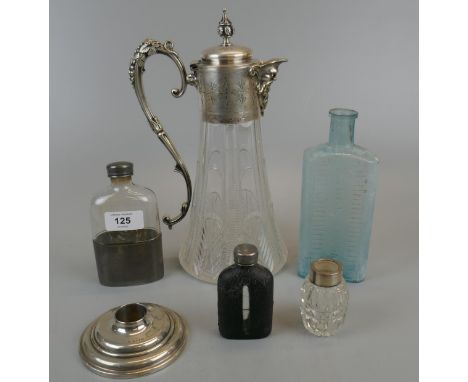 Collection of bottles together with a hallmarked silver candlestick and claret jug
