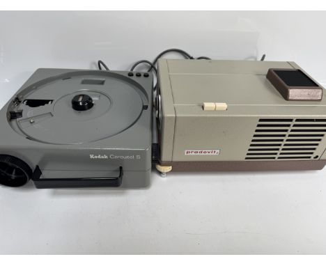 A Kodak and a Leitz slide projector.