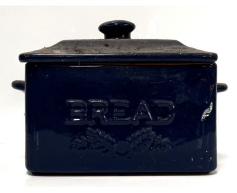 A terracotta bread bin, 22 cm.