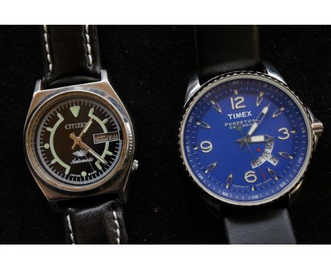 Timex Perpetual Wrist Watch together with a Citizen Wrist Watch (Both Currently Ticking)