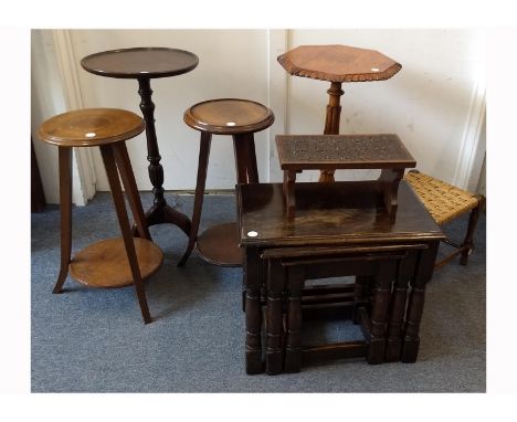 A nest of three oak tables, largest 53 cm wide x 33 cm deep x 45 cm high; together with a William IV oak tripod table; a cont