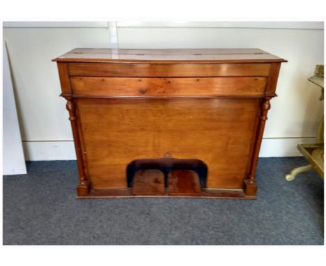 A yew wood cased harmonium, five octaves, ogee footwell, missing bellows, 103 cm wide x 35 cm deep x 77 cm high