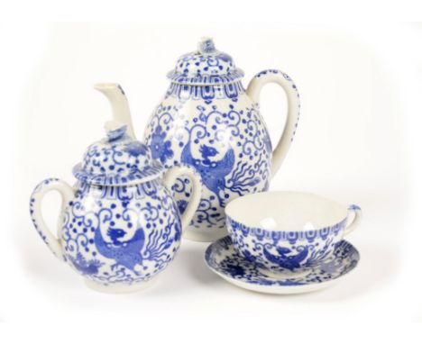 A 20th Century Japanese porcelain part tea service, blue and white phoenix and scroll decoration, comprising 14 teacups and s