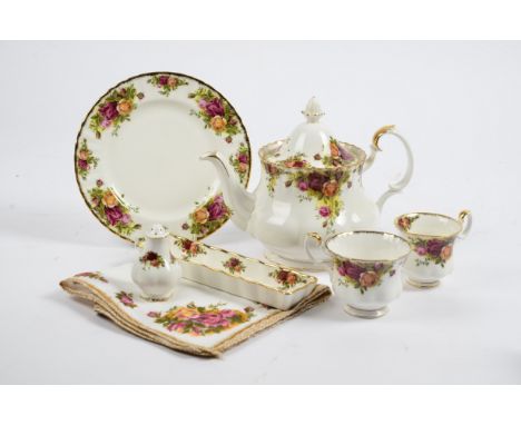 A Royal Albert 'Old Country Roses' pattern part tea and dinner service, conprising three tea and coffee pots, seven teacups a