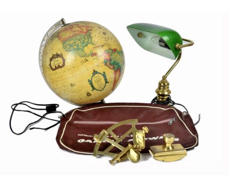 A desktop collection, including brass banker's lamp, swivel green shade, 39 cm high; together with a brass sextant, brass des