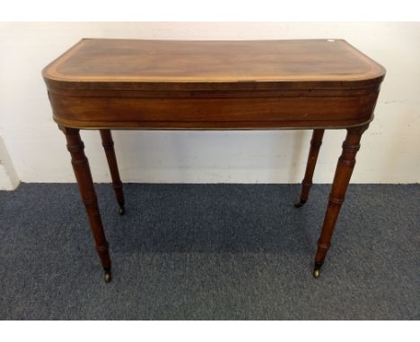 A Georgian mahogany card table, satinwood inlay, ebony stringing and brass edging, hinged top revealing green baize playing s