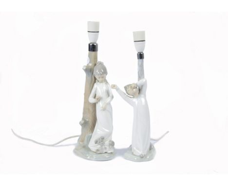 Two Nao Lladro ceramic lamp bases, both in the form of tree trunks, one with the figure of a girl and her dog, 38 cm high, th