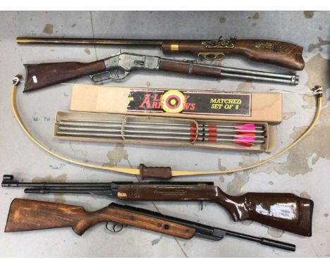 Selection of air rifles and pistols, together with a bow and arrow set