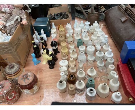Large collection of ceramic novelty and other pie funnels.