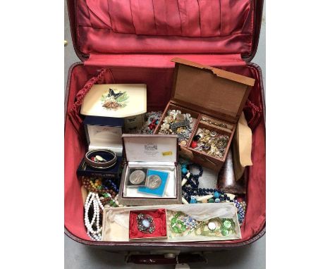 Vintage case of costume jewellery including various bead necklaces, brooches, jewellery boxes and an empty Omega watch box 