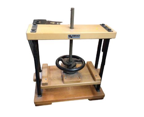 Dryad book press together with surveyor's tools