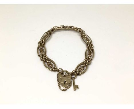 9ct gold gate bracelet with key charm and padlock claspWeight 13.5 grams 