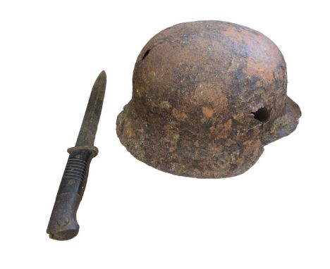 First World War helmet and a bayonet