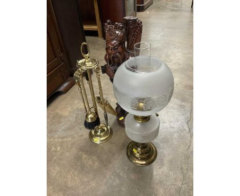 Chinese carved wooden figure, brass oil lamp and a brass fire companion set and a watercolour